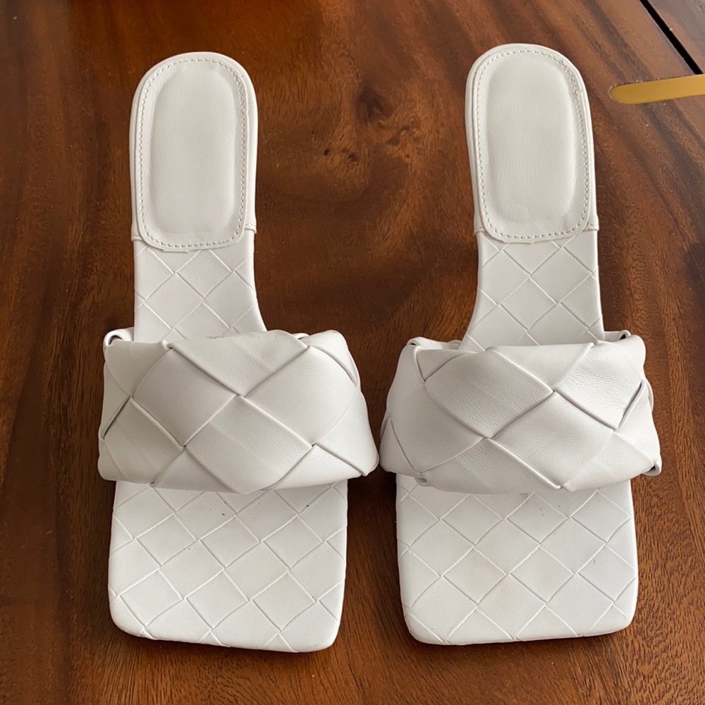 White leather slide heals. Only worn once. Comfortable and easy to walk in.